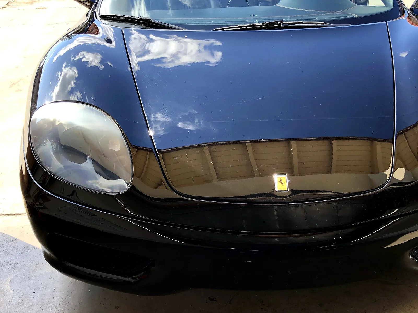 Failed smog check help in Escondido, CA: black sports car in our bay