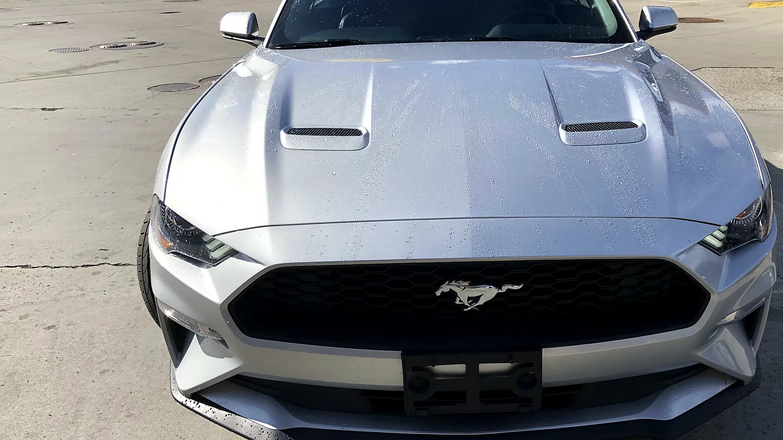 Out-of-state vehicle smog check in Escondido, CA: silver Ford Mustang in the lot
